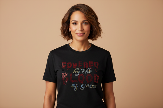 Model wearing the Covered by the Blood of Jesus Tee
